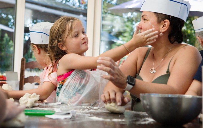 Breadmaking mother and daughter