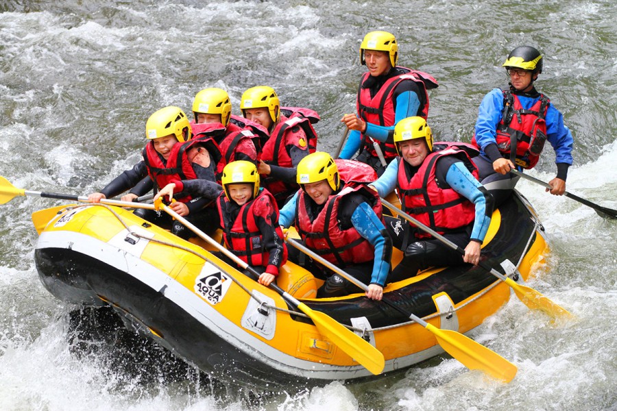 Families whitewater rafting